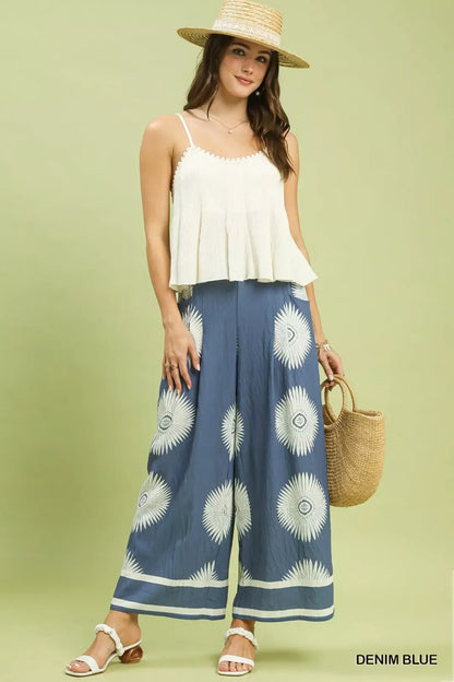 Blue Umgee abstract border print wide-leg pants with relaxed fit and stylish design, perfect for casual or chic outfits.