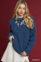 Trendsi Umgee denim blue cable knit cozy sweater featuring a soft, chunky knit design and a relaxed fit.
