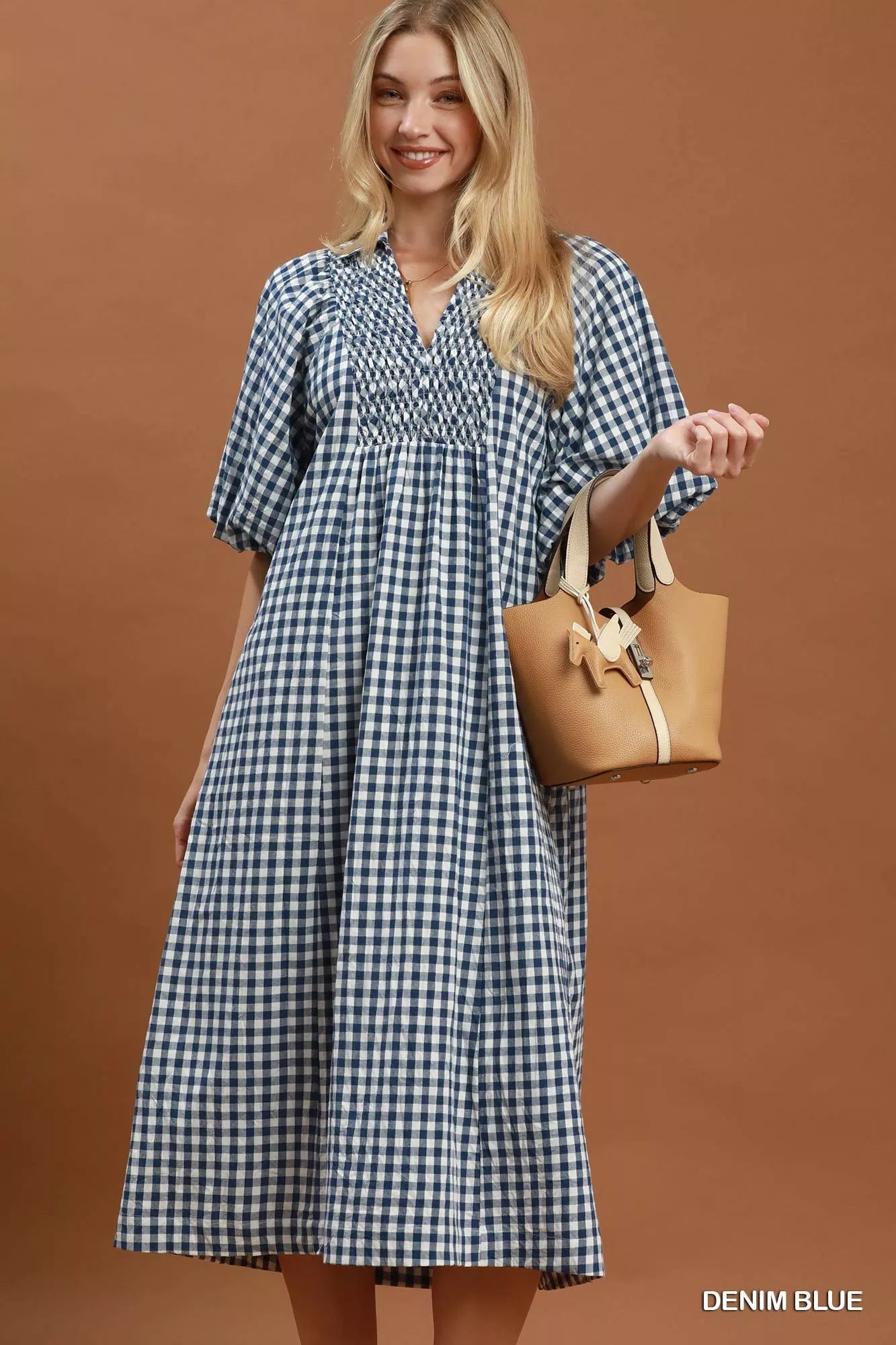 Denim blue Umgee puff sleeve plaid midi dress with a fitted waist and flared skirt, featuring a stylish, casual design.