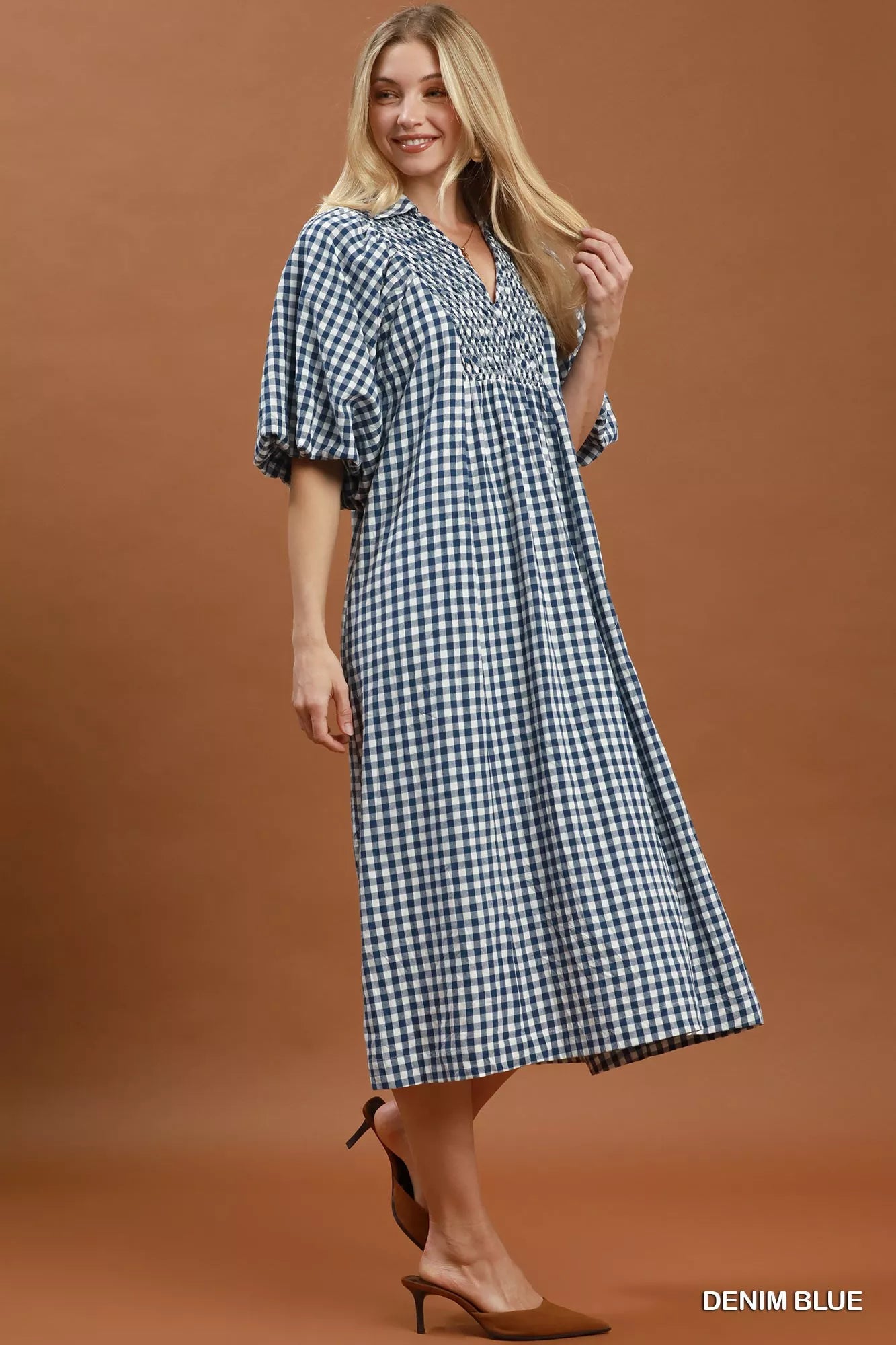 Denim blue Umgee plaid midi dress with puff sleeves, stylish and comfortable, perfect for casual or semi-formal occasions.