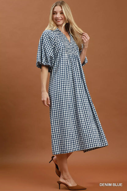 Denim blue Umgee plaid midi dress with puff sleeves, stylish and comfortable, perfect for casual or semi-formal occasions.