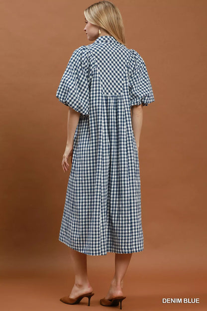 Denim blue Umgee puff sleeve plaid midi dress featuring a fitted waist and classic plaid pattern, perfect for casual or semi-formal wear.
