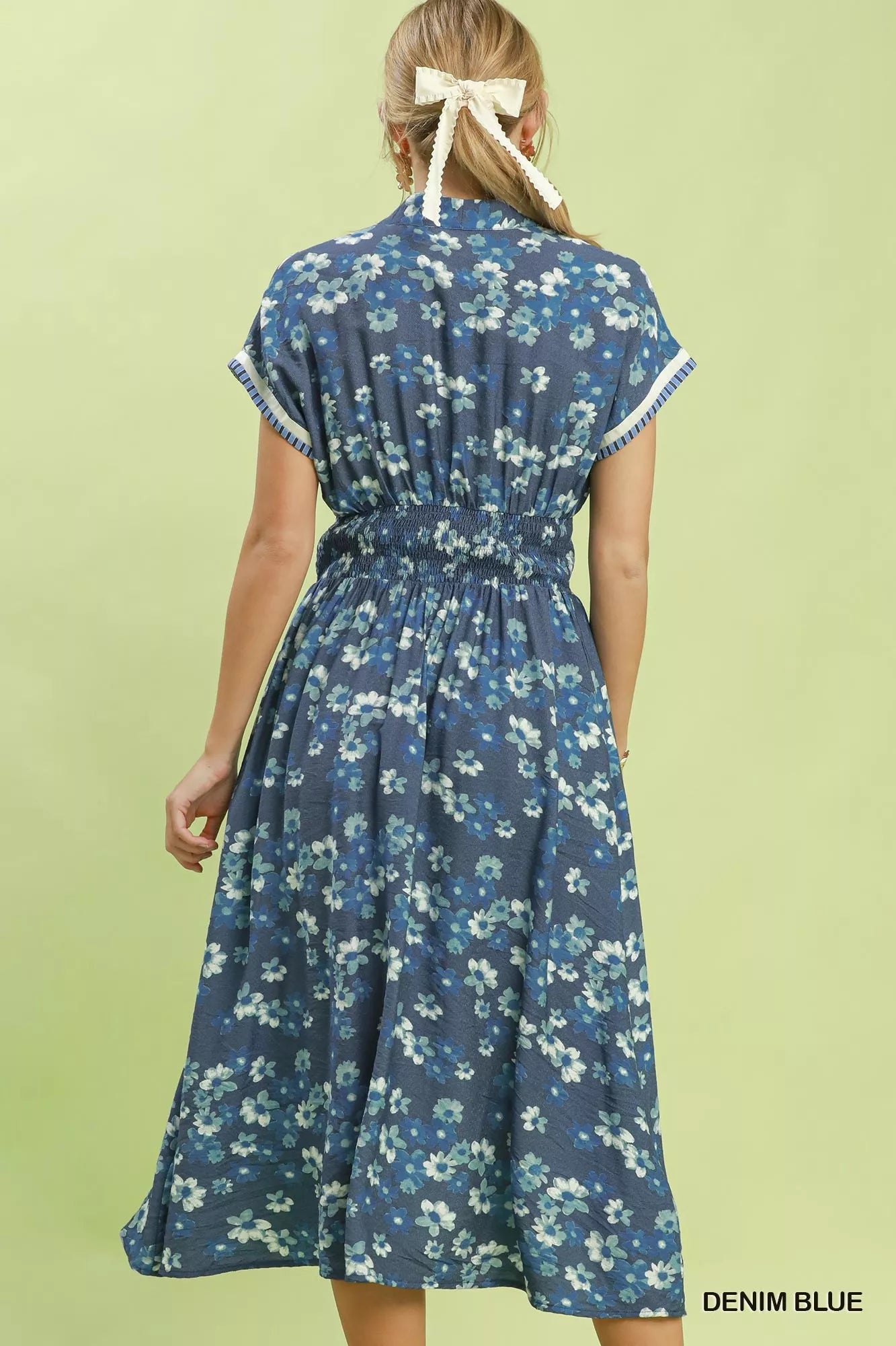 Denim blue Umgee ruffle sleeve henley shift dress with button-front and relaxed fit, styled for casual wear.