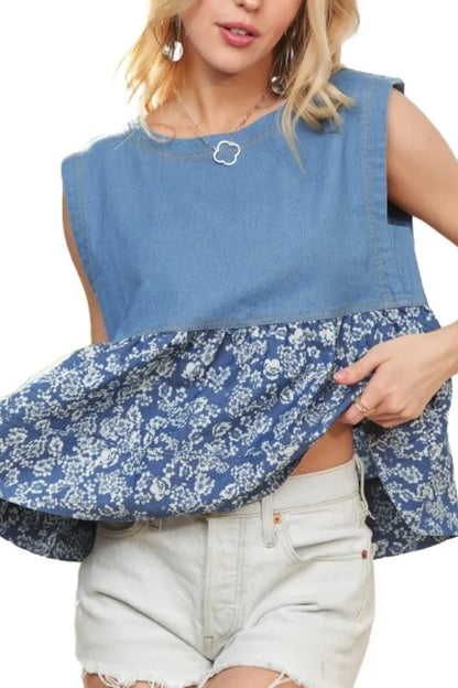 Sleeveless denim contrast top by Trendsi, with a fitted silhouette and button front, styled with casual fashion.