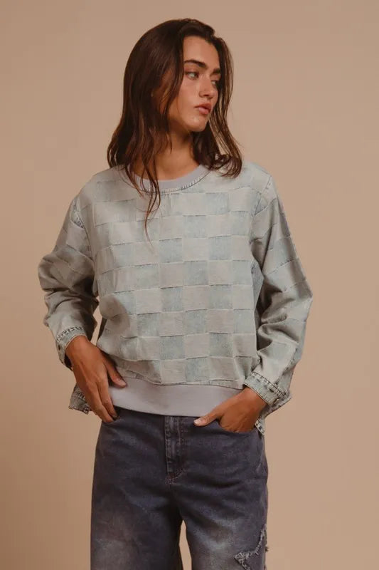 Trendsi BiBi mineral washed checkered round neck denim top with long sleeves and button details on a model.