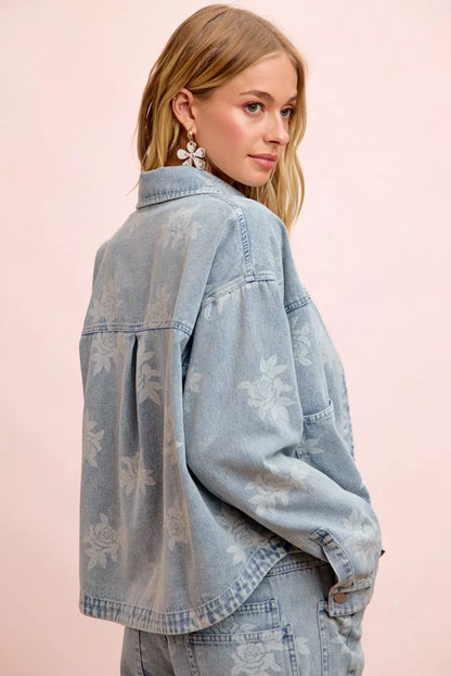 Trendsi BiBi printed washed denim jacket featuring a front pocket and stylish design, displayed on a hanger.