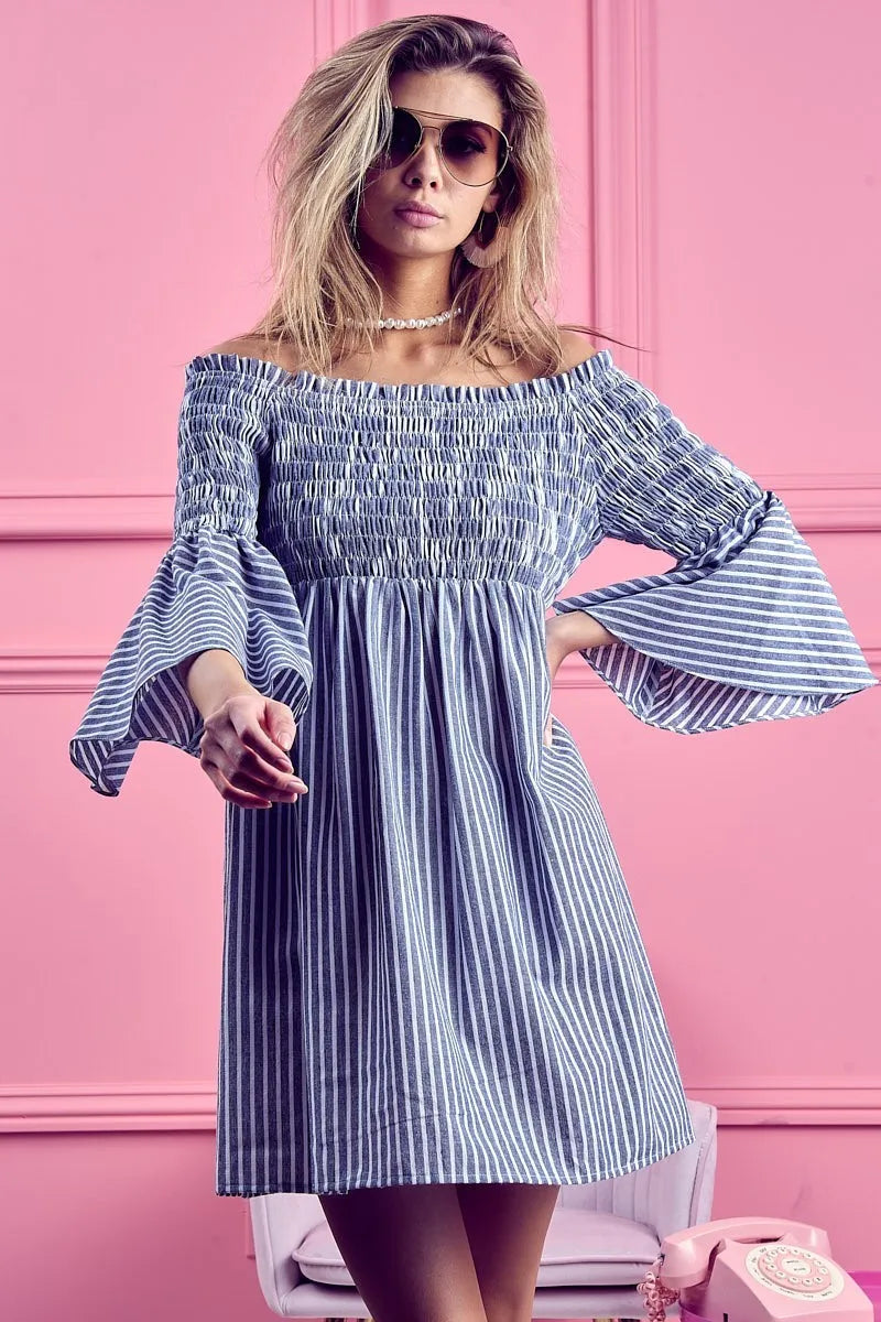 Trendsi BiBi smocked off-shoulder striped dress featuring a relaxed fit and casual summer style, shown on a model.