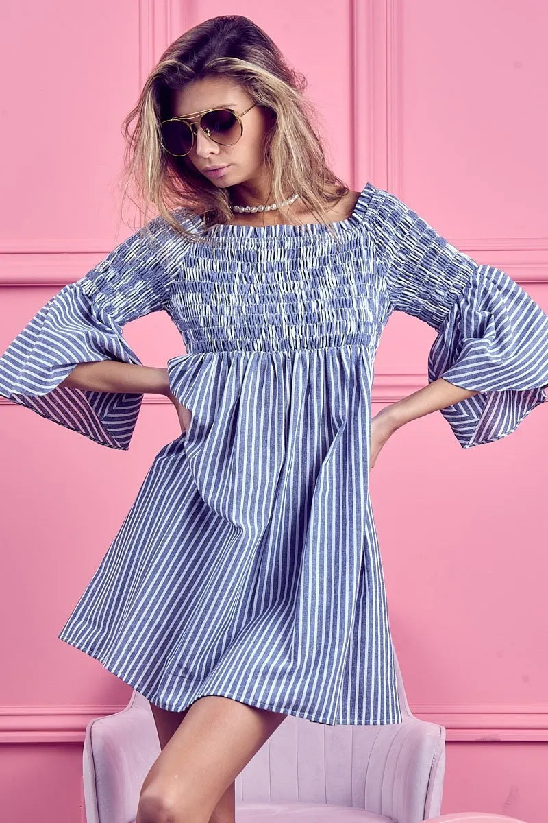 Trendsi BiBi smocked off-shoulder striped dress with blue and white horizontal stripes, lightweight fabric, and relaxed fit.