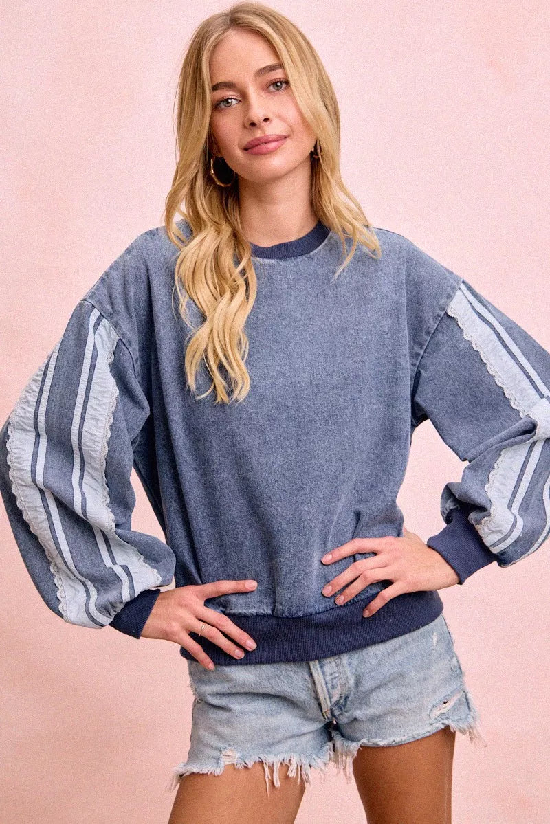 Trendsi BiBi washed denim sweatshirt with lace contrast sides, featuring a casual fit and stylish denim fabric.
