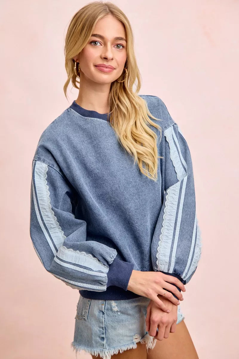 Trendsi BiBi Washed Denim Lace Contrast Sided Sweatshirt showing denim fabric, lace details, and casual fit.