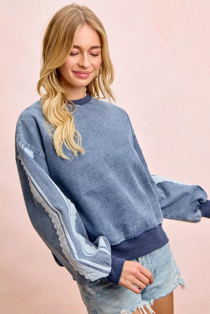 Trendsi BiBi washed denim sweatshirt with lace contrast sides, casual fit, and stylish denim fabric.