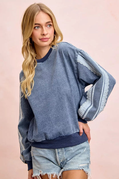 BiBi washed denim sweatshirt with lace contrast sides, casual long sleeve top by Trendsi, stylish and comfortable denim fashion.