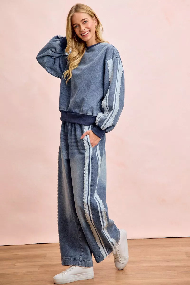 Trendsi BiBi washed denim sweatshirt with lace contrast sides, casual long-sleeve top, stylish denim fabric, and relaxed fit.