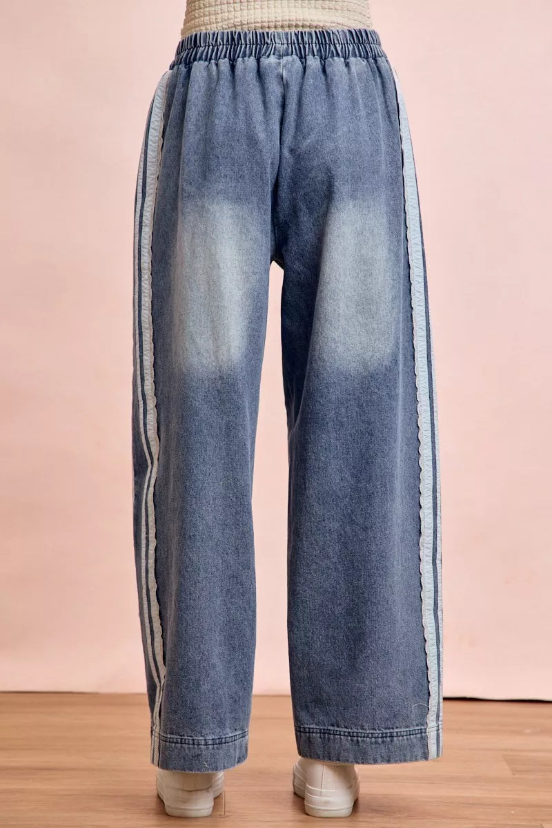 Trendsi BiBi Washed Lace Contrast Sided Jeans featuring distressed denim, lace accents, and a relaxed fit.