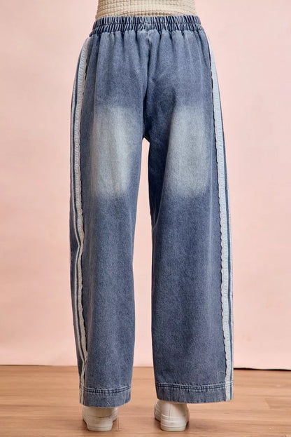 Trendsi BiBi Washed Lace Contrast Sided Jeans featuring distressed denim, lace accents, and a relaxed fit.