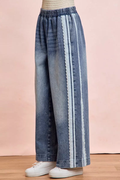 Trendsi BiBi washed lace contrast-sided jeans featuring distressed denim and lace details, casual and stylish for everyday wear.