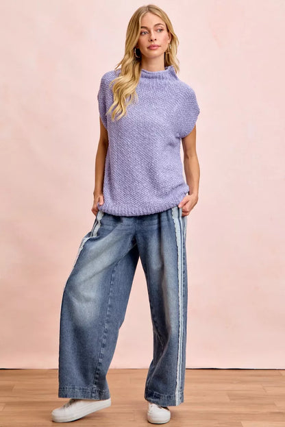 Trendsi BiBi washed lace contrast-sided jeans showing distressed denim with lace accents on the sides.