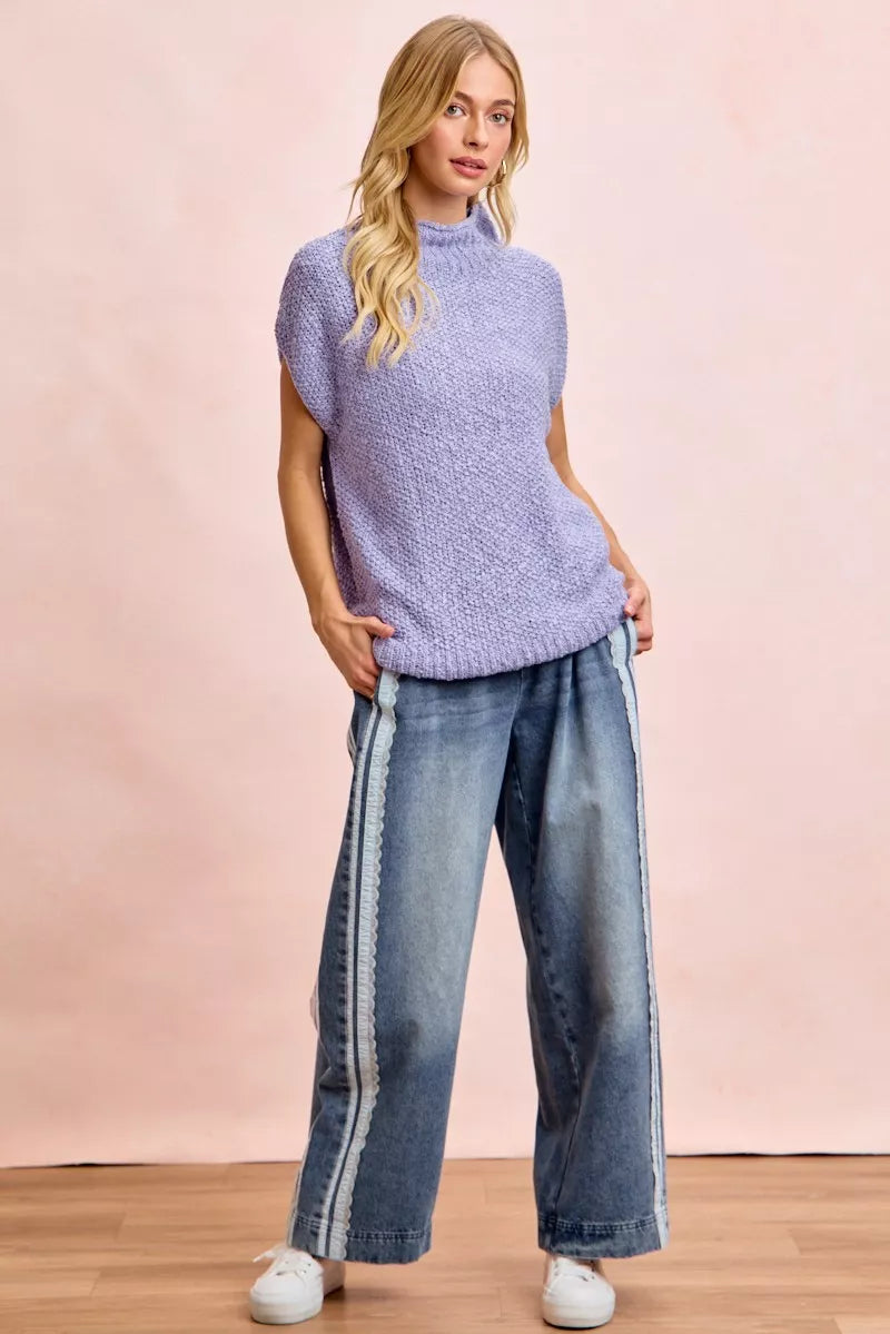 Trendi BiBi washed lace contrast-sided jeans featuring distressed denim, lace accents, and a relaxed fit.