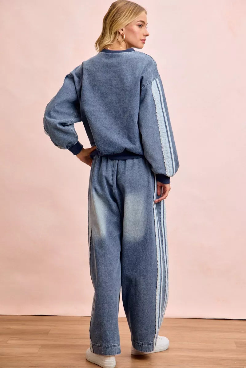 Trendsi BiBi washed lace contrast-sided jeans showing distressed denim with lace accents on the sides.