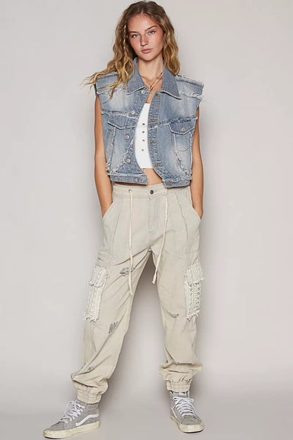 Trendsi asymmetrical front closure raw hem denim vest, casual sleeveless top with unique design and distressed hem details.