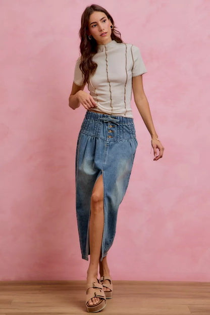 Trendsi SO ME pleated washed denim skirt with front slit, stylish casual skirt featuring a high waist and flowing pleats.