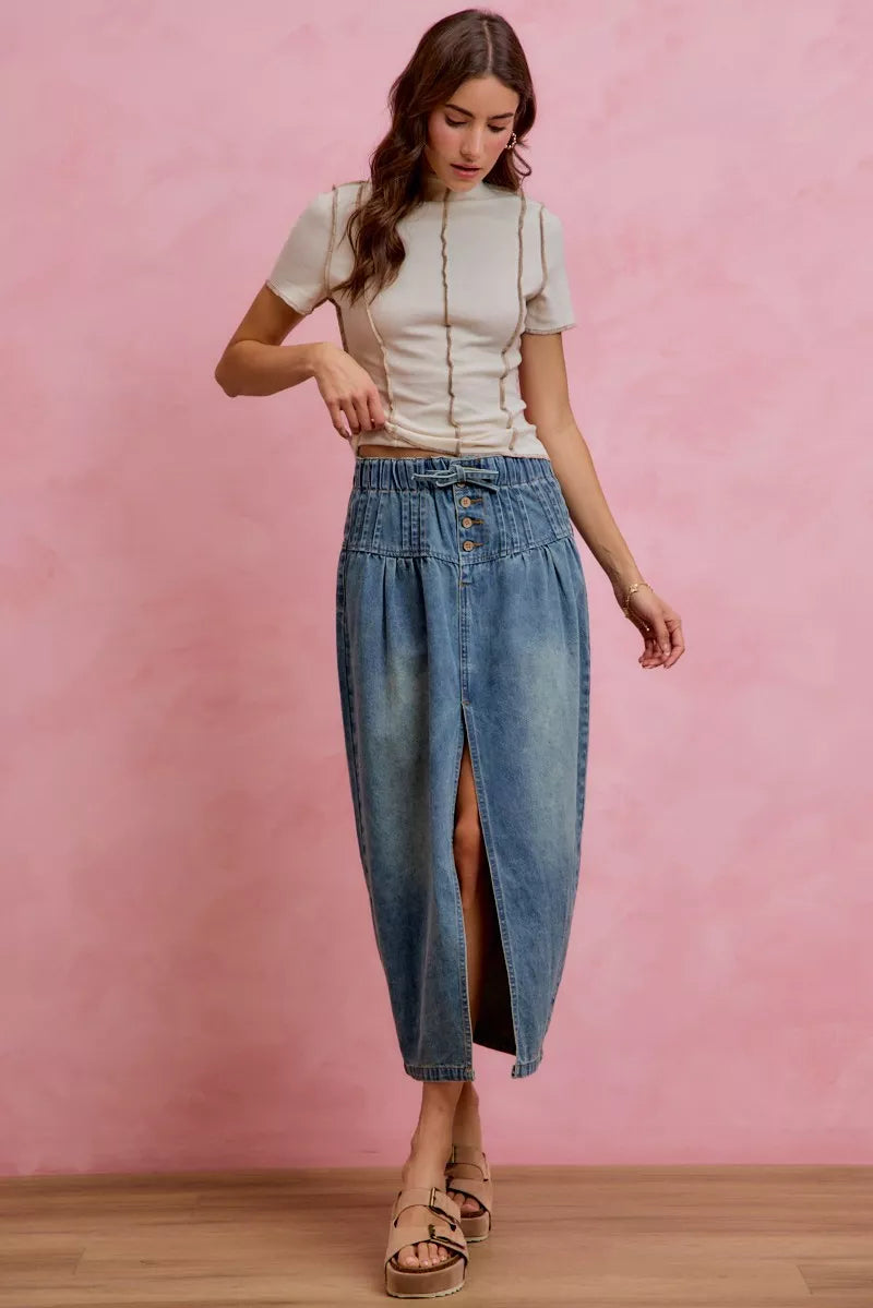Trendsi SO ME pleated washed denim skirt with front slit, showcasing a stylish high-waisted design and casual denim texture.