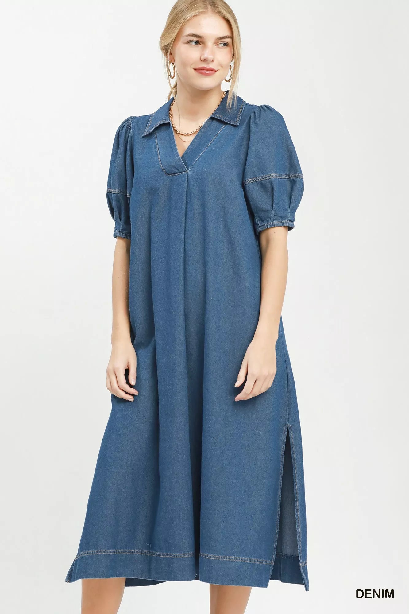 Light blue chambray dress with a collar and puff sleeves, featuring a relaxed fit, by Umgee for a casual, stylish look.