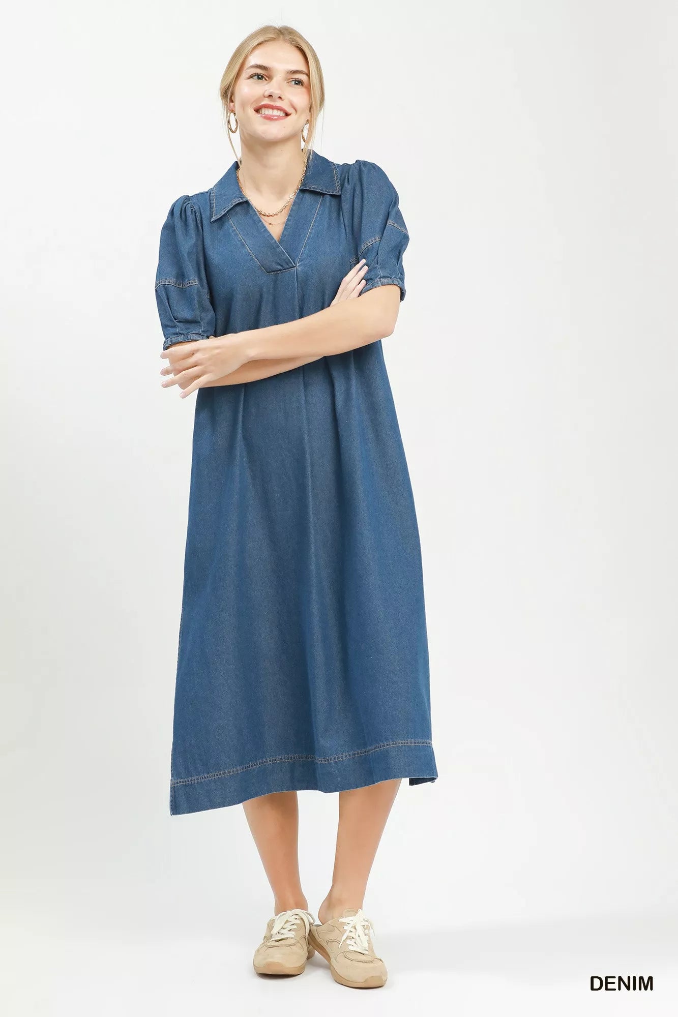 Umgee chambray collared puff sleeve dress with button front and relaxed fit, styled on a hanger.