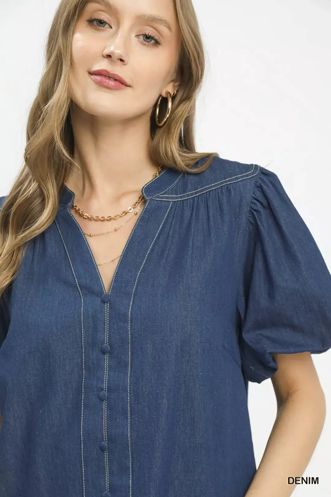 Umgee denim button-front boho blouse with puff sleeves, featuring a casual and stylish design.
