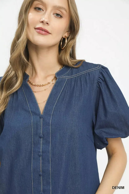 Umgee denim button-front boho blouse with puff sleeves, featuring a casual and stylish design.