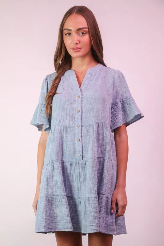 Trendsi Very J Mineral Washed Baby Bell Sleeve Woven Mini Dress displayed on a hanger, showcasing its casual, boho-inspired design.