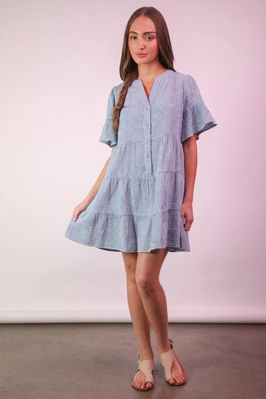 Trendsi Very J Mineral Washed Baby Bell Sleeve Woven Mini Dress displayed on a hanger, showcasing its bell sleeves and mini length.