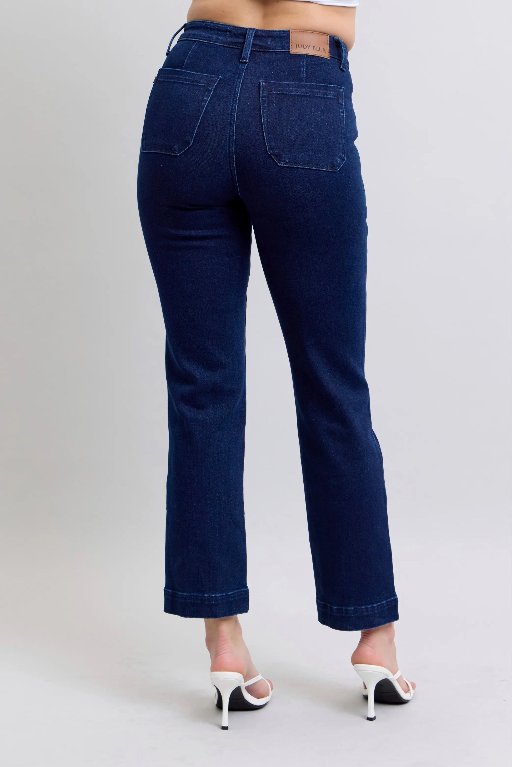 Plus size Judy Blue work wear knee patch straight jeans with denim fabric and functional pockets, designed for a comfortable fit.