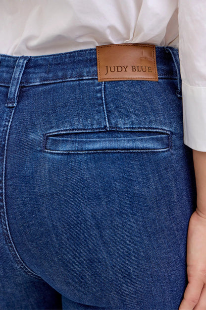 Judy Blue high waist flare jeans with front patch pockets, showcasing a trendy denim style with a fitted waist and flared legs.