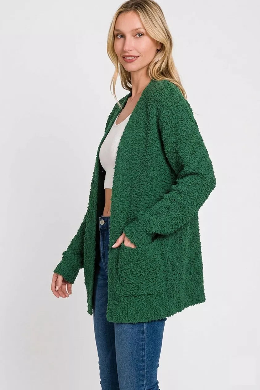 Dark green Zenana long sleeve popcorn sweater cardigan with pockets, featuring a cozy, textured knit design.