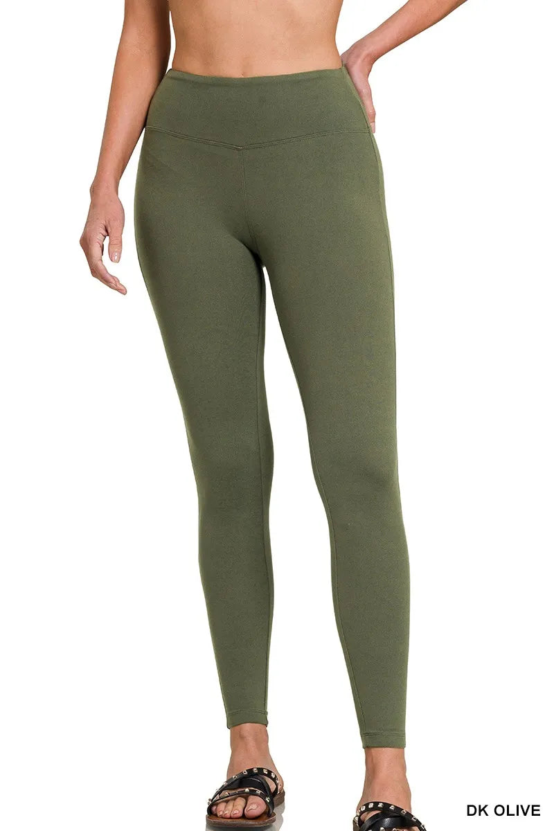 Olive green Zenana microfiber waistband leggings with a comfortable stretch fit, shown on a model, from Trendsi.