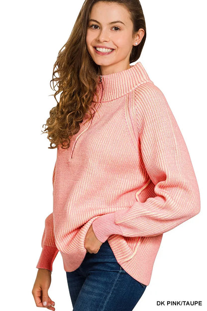 Pink and taupe Zenana Ribbed Two Tone Half Zip Sweater featuring a cozy fit and stylish design, displayed on a hanger.
