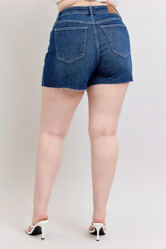 Plus size Judy Blue high waist denim shorts with criss-cross waistband and cuffed hem, featuring a stylish and comfortable fit.