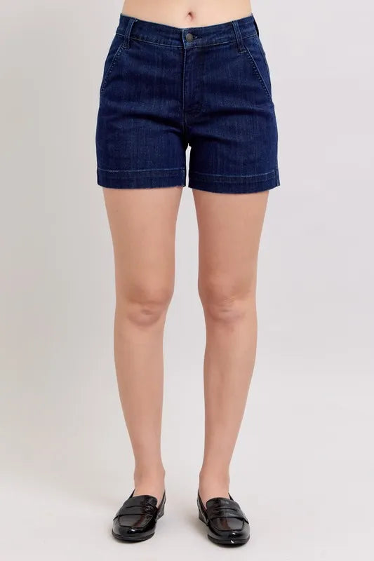 Plus size Judy Blue high waist denim shorts with a classic blue wash, designed for a comfortable fit and stylish look.