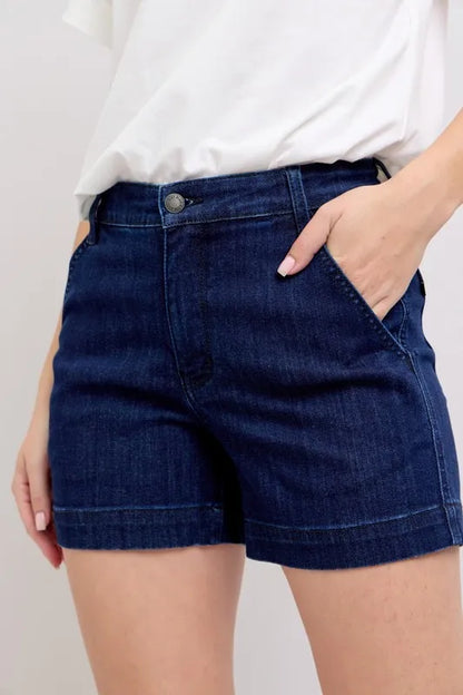 Plus size Judy Blue high waist denim shorts with a classic blue wash, featuring a relaxed fit and stylish cut.