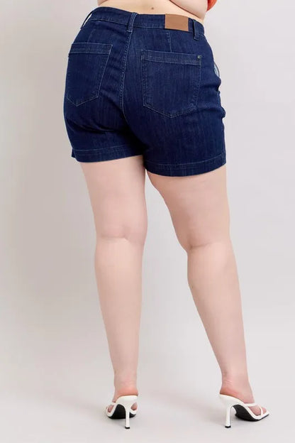 Plus size Judy Blue high waist denim shorts with a classic blue wash and fit, designed for full-figure comfort and style.