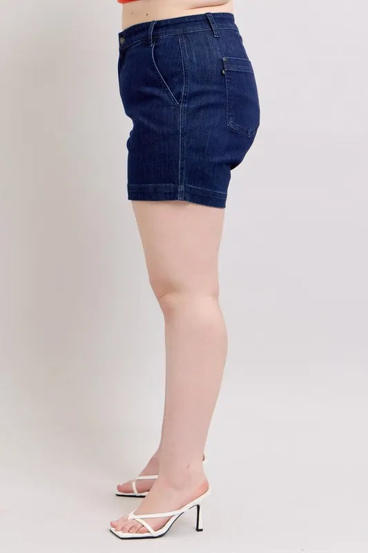 Plus size Judy Blue high waist denim shorts with a classic blue wash, designed for a comfortable fit and stylish look.