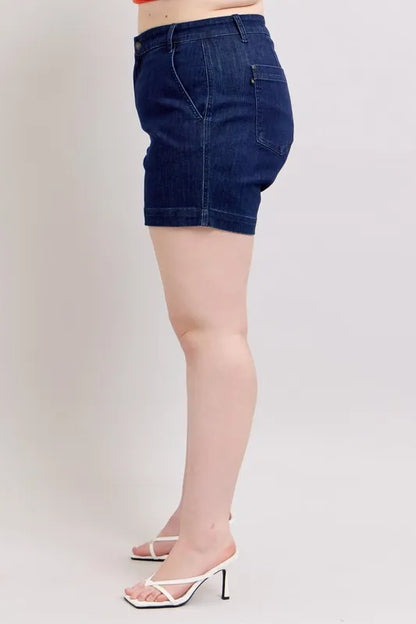 Plus size Judy Blue high waist denim shorts with a classic blue wash, designed for a comfortable fit and stylish look.