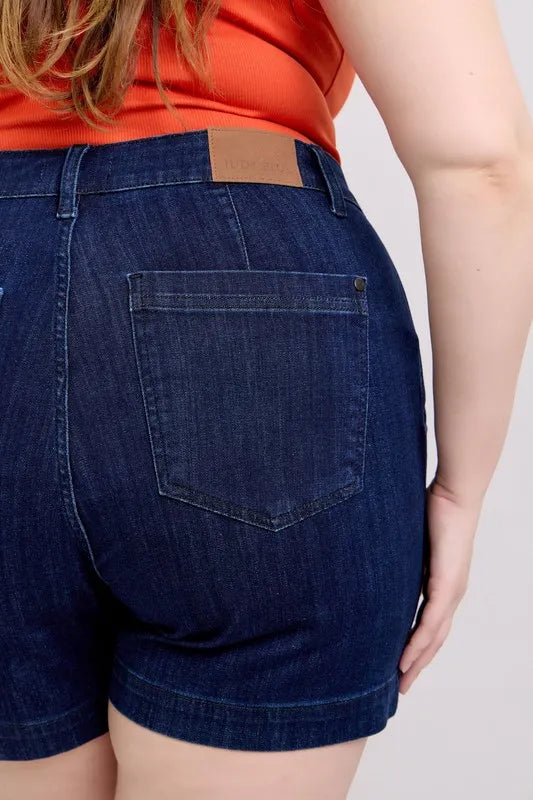 Plus size Judy Blue high waist denim shorts with distressed details and classic five-pocket design, perfect for casual summer wear.