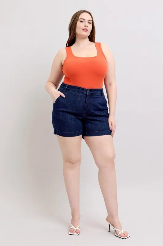 Plus size Judy Blue high waist denim shorts with a classic blue wash, designed for a comfortable, flattering fit.
