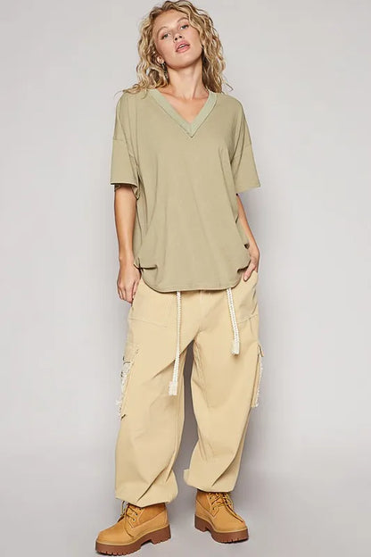 Trendsi dried moss POL V-neck half-sleeve T-shirt displayed flat, showcasing soft fabric and casual style for women.