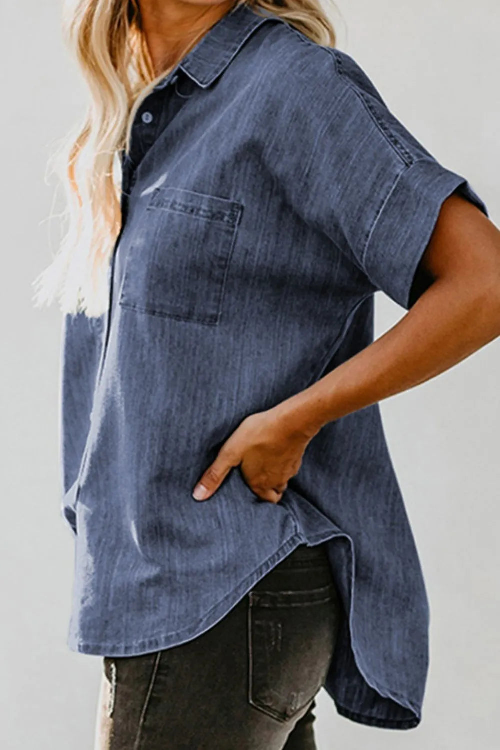 Dusty blue denim short sleeve shirt with front pockets from Trendsi, featuring a button-up design and casual style.