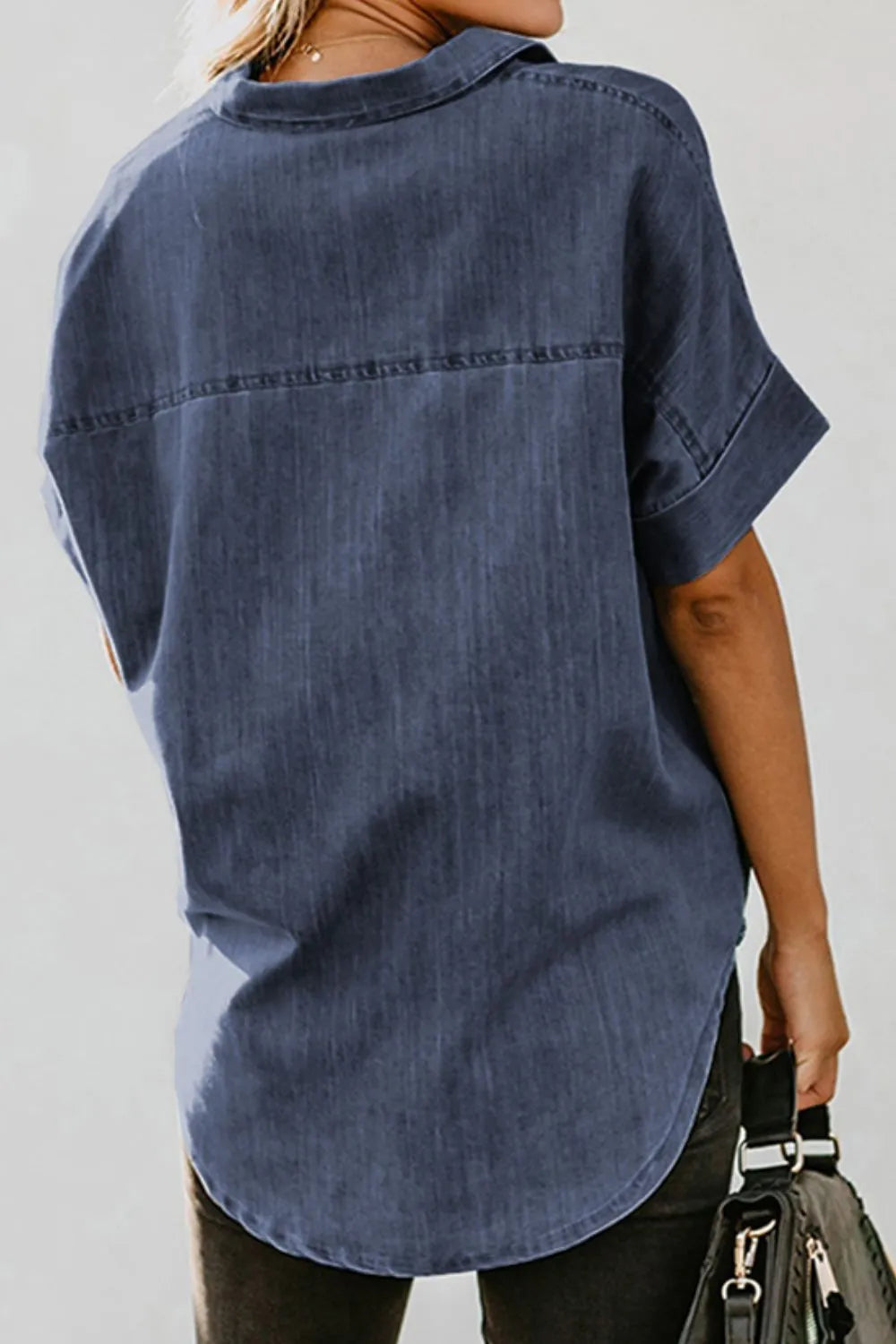 Dusty blue denim shirt by Trendsi with pocket detail, short sleeves, button-up front, casual style for everyday wear.