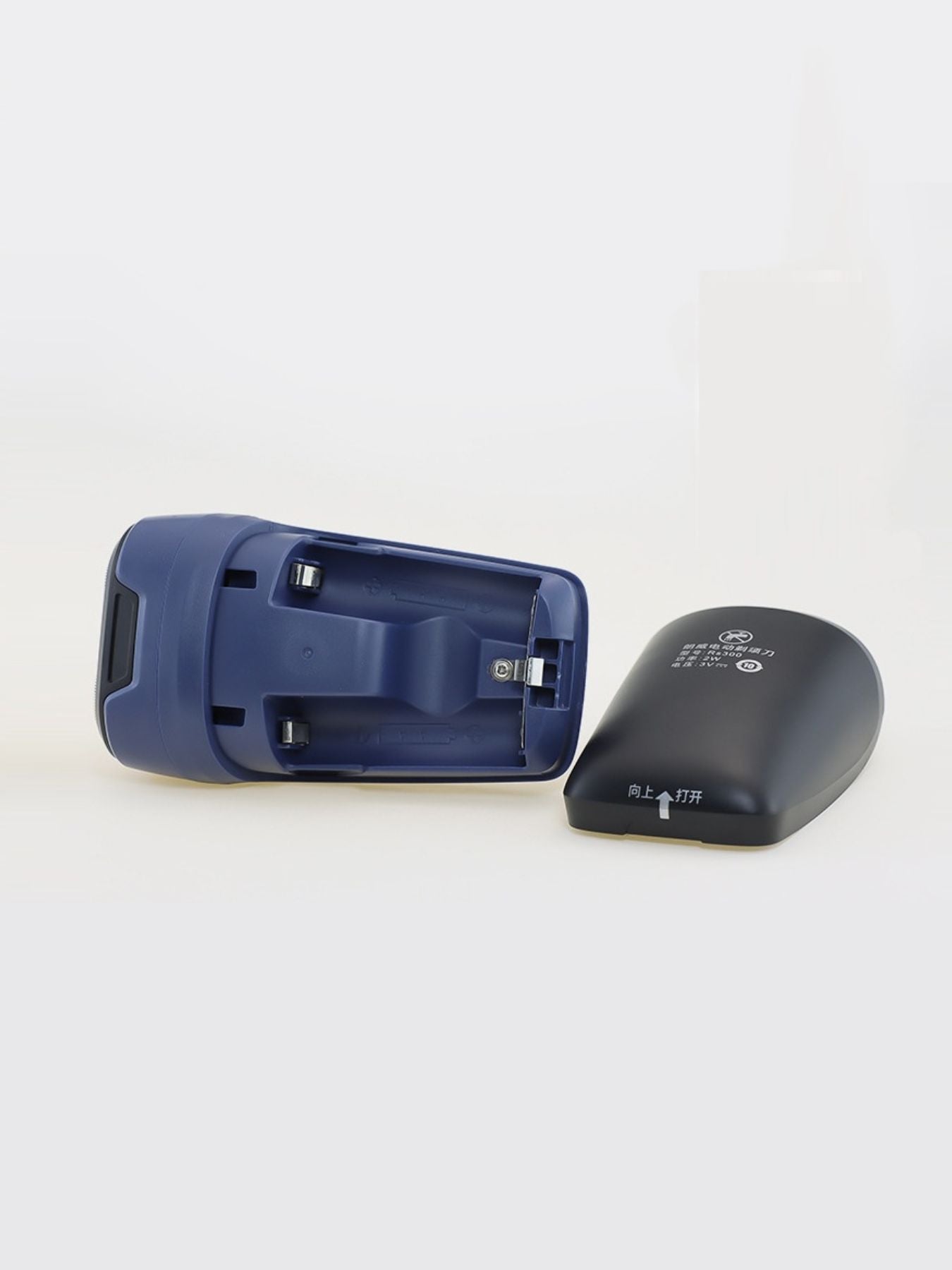Dusty blue Trendsi portable electric shaver with ergonomic design and compact size for convenient grooming.