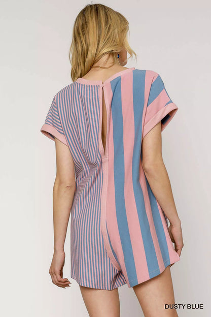 Dusty blue Umgee mixed striped short sleeve romper with a relaxed fit, displayed on a hanger.